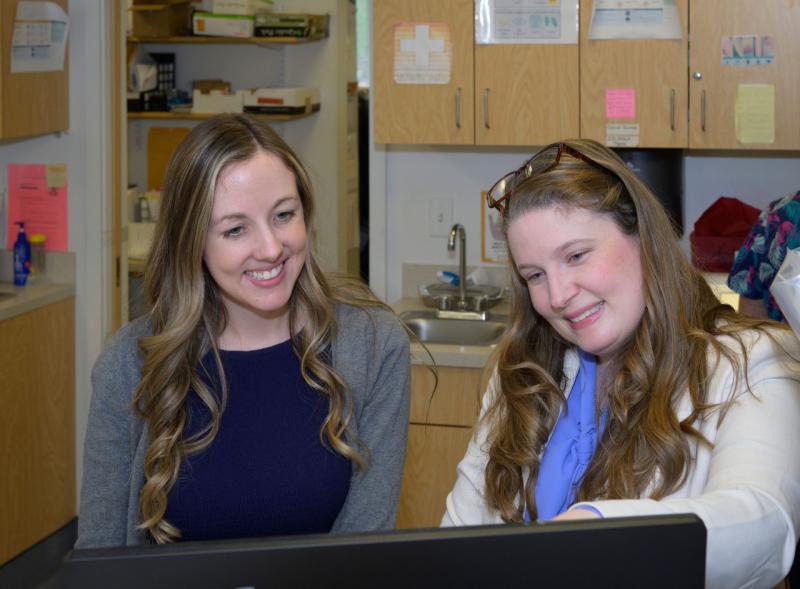 two women smiling